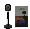 Sunset red coloured USB rechargeable projection lamp showing rainbow light projection