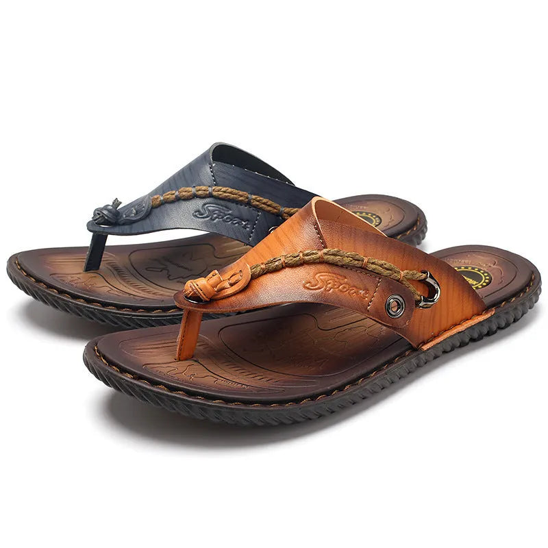 Men's dark blue herringbone pattern outdoor slippers with a rubber sole, shown from the side.