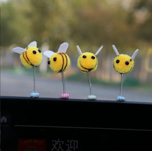 Soft fur ball bee car decoration measuring 3x3 centimetres with cartoon design