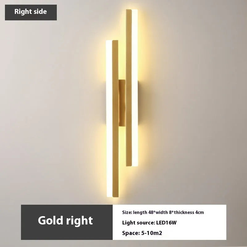 Modern Scandinavian minimalist LED wall light with acrylic shade in black or gold finish.