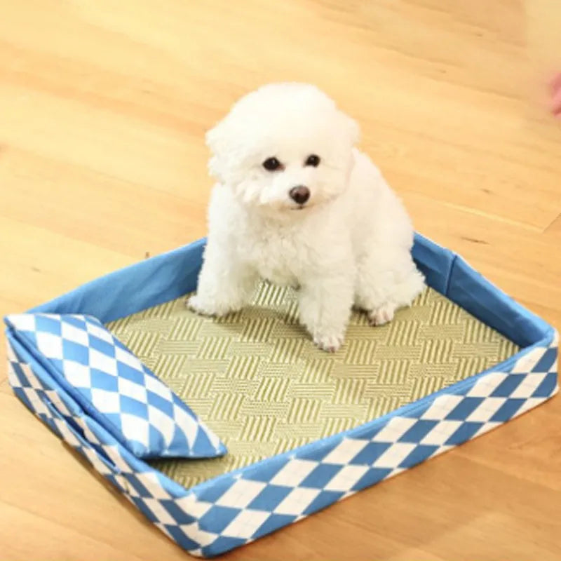 Blue woven rattan cat bed with non-slip base placed on a wooden floor.