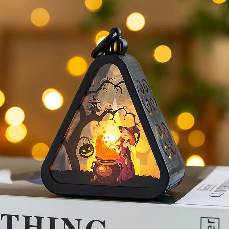 Halloween pumpkin lamp decoration in one of four designs: pumpkin, witch, castle or ghost hand