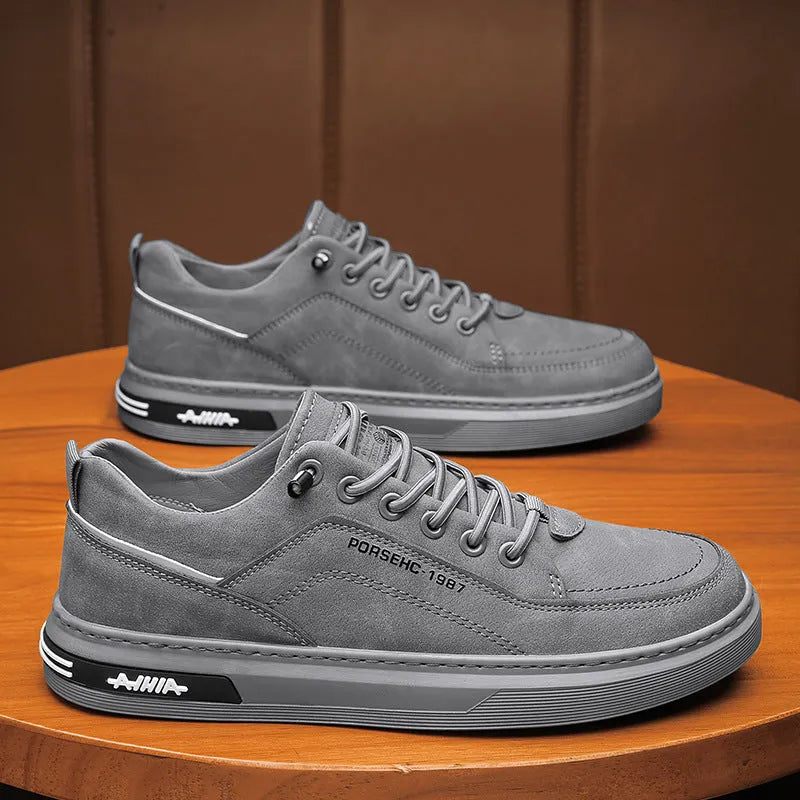 Men's waterproof casual work shoes with rubber soles in black, gray, and khaki colour options