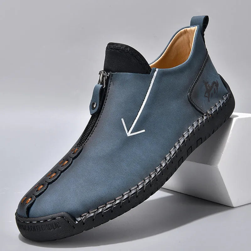 Men's brown leather martin boots with front zipper and hand-stitched detailing