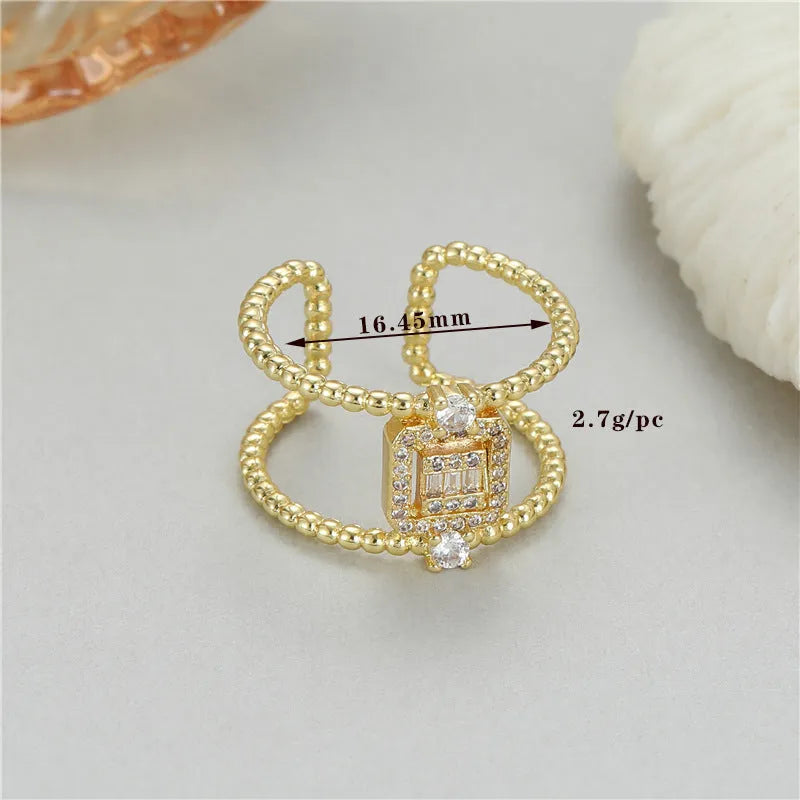 Adjustable asymmetric open ring in 14K gold-plated copper, colour H12813.