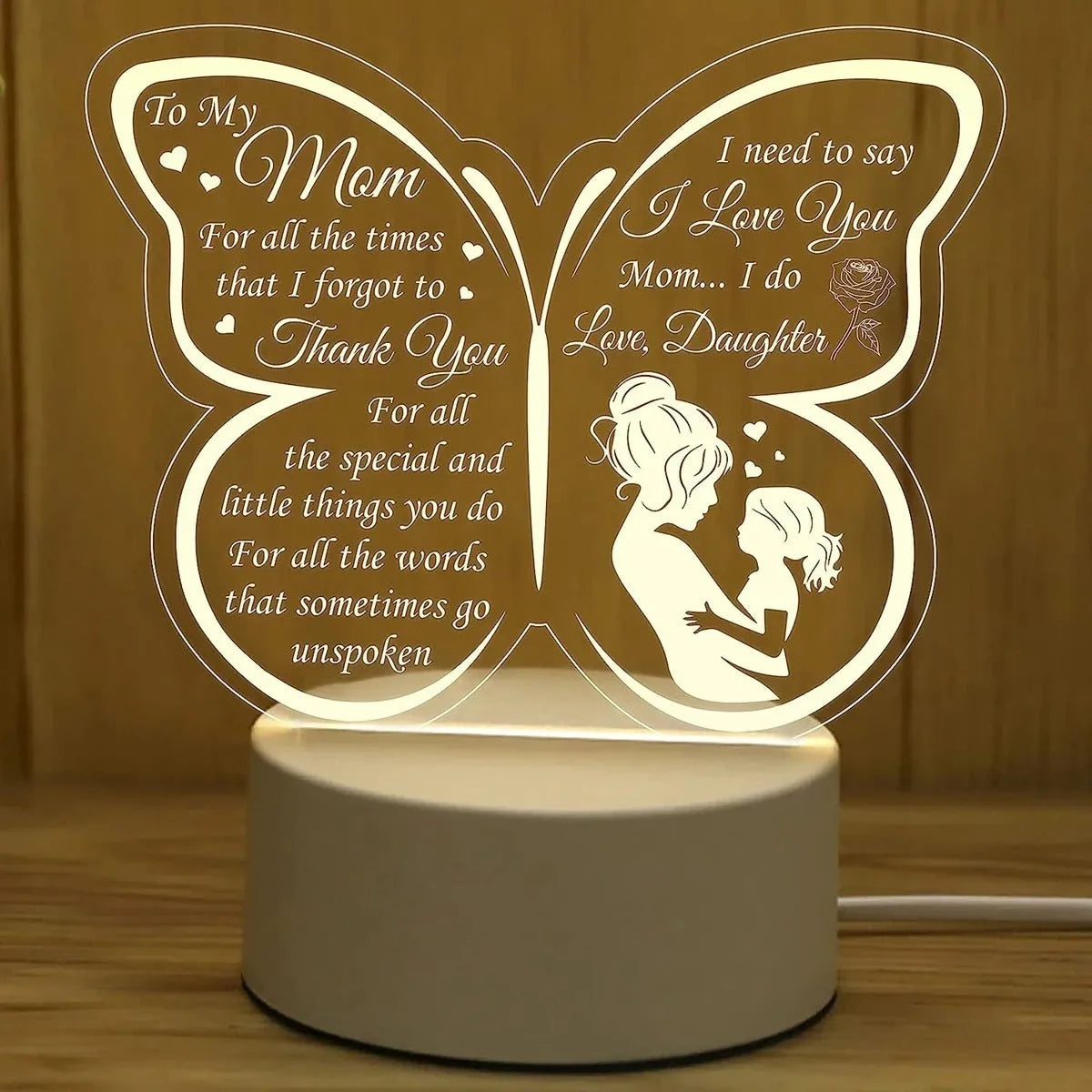 White heart-shaped USB table lamp with touch switch on a wooden surface.
