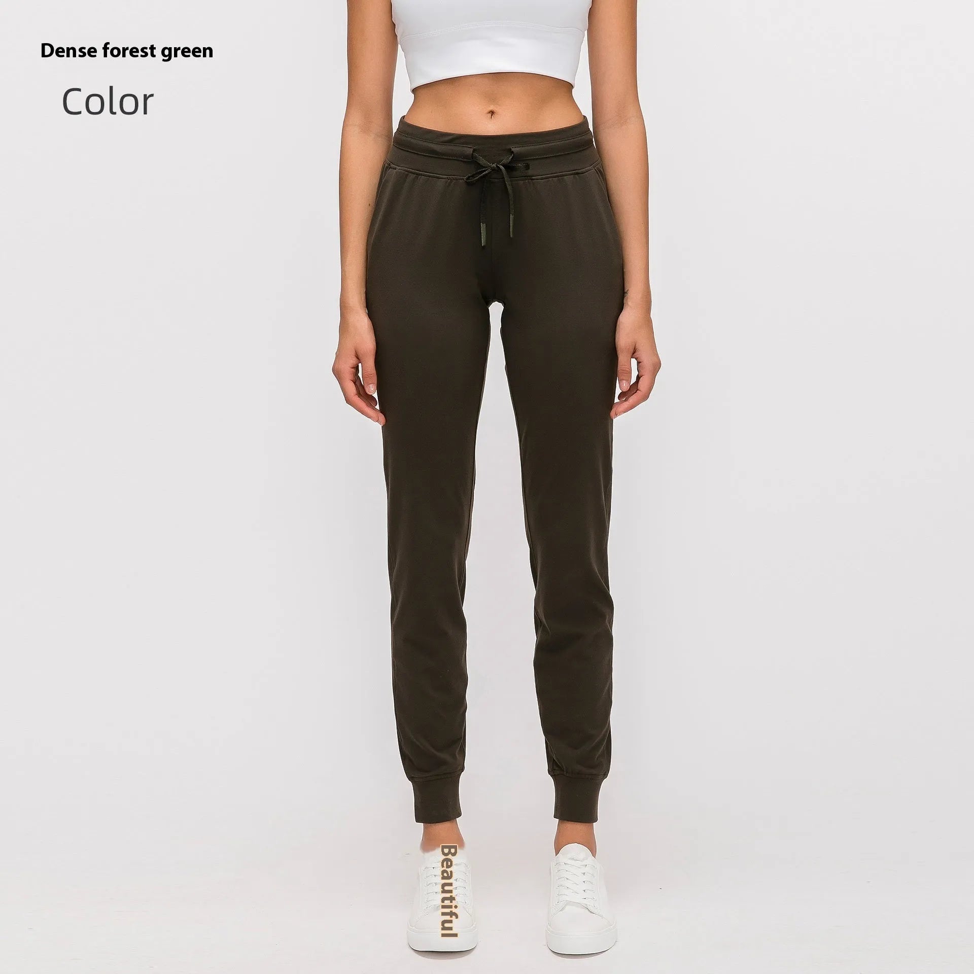 Women's high-waist yoga pants in distilled coffee colour with an elastic drawstring waist for fitness.