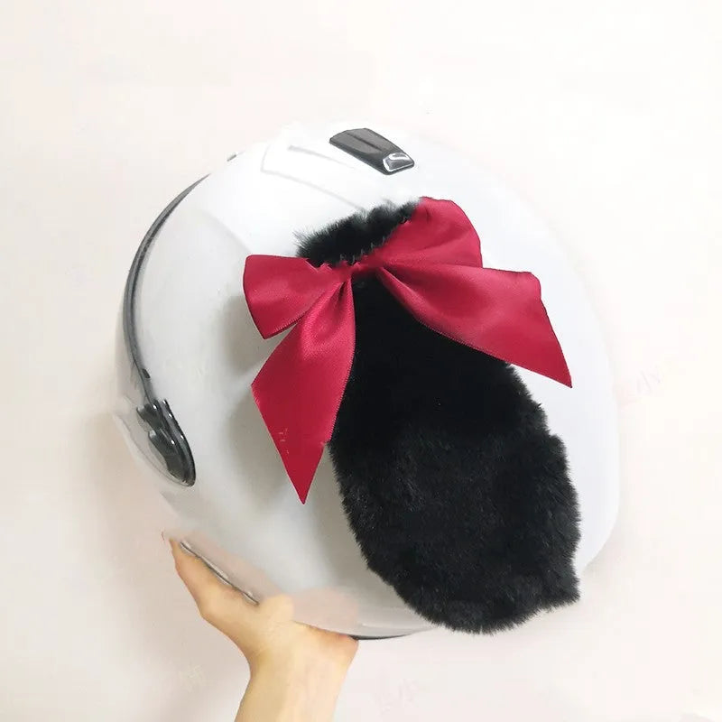 Carbon fibre rabbit ears motorcycle helmet decoration in black on a full-face helmet.