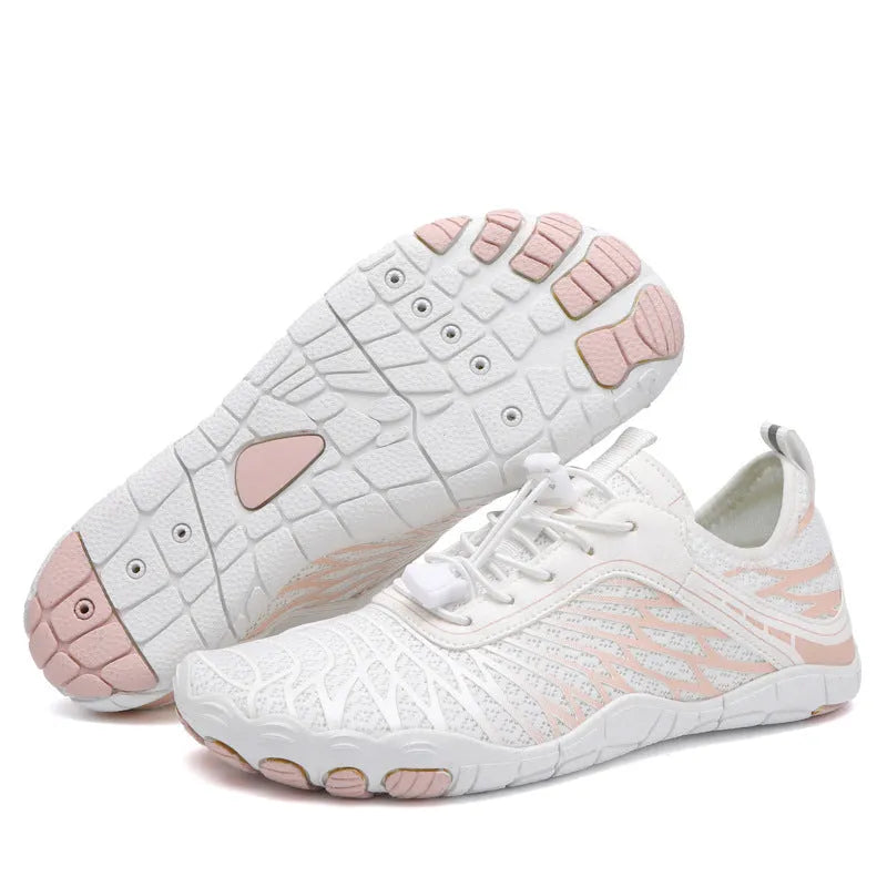 Men's white and black lace-up casual sports shoes with rubber sole on a plain background