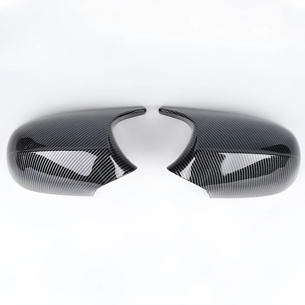 Pair of black ABS plastic rearview mirror housings for BMW 3 Series E90 on a white background.