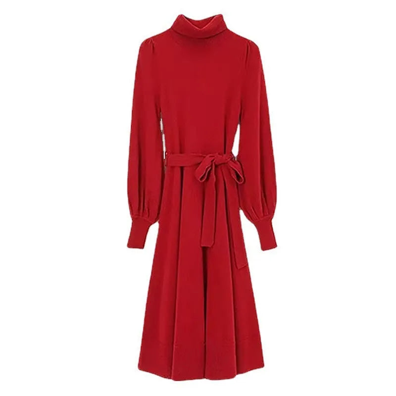 Turtleneck knitwear dress in polyester fabric with elastic waist and loose hem in solid colour