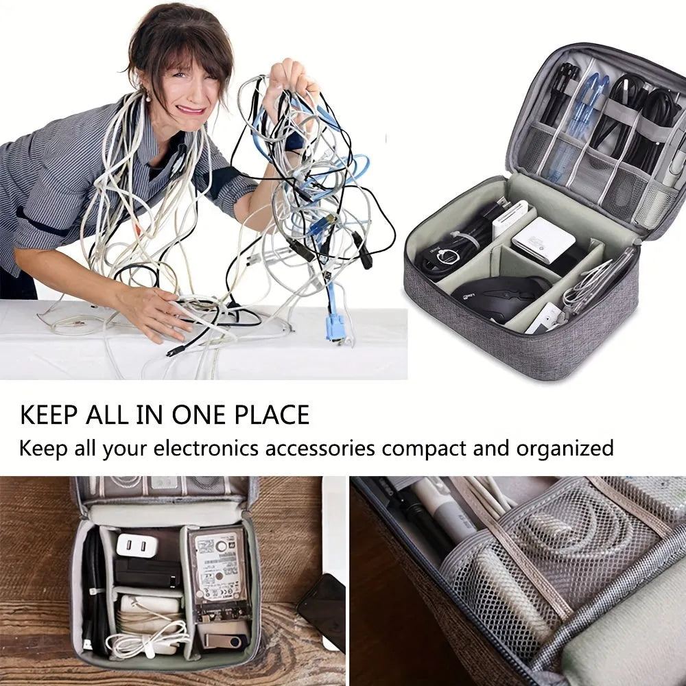 Black travel cable organiser bag open, showing mesh pockets, elastic loops, and removable padded dividers inside.