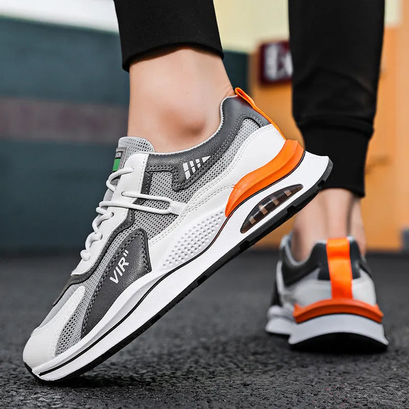 Men's grey breathable mesh casual running shoes with a lightweight EVA sole on a white background.