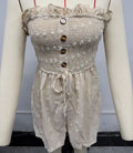 Women's blue off-shoulder jumpsuit with button detail and fifth pants length