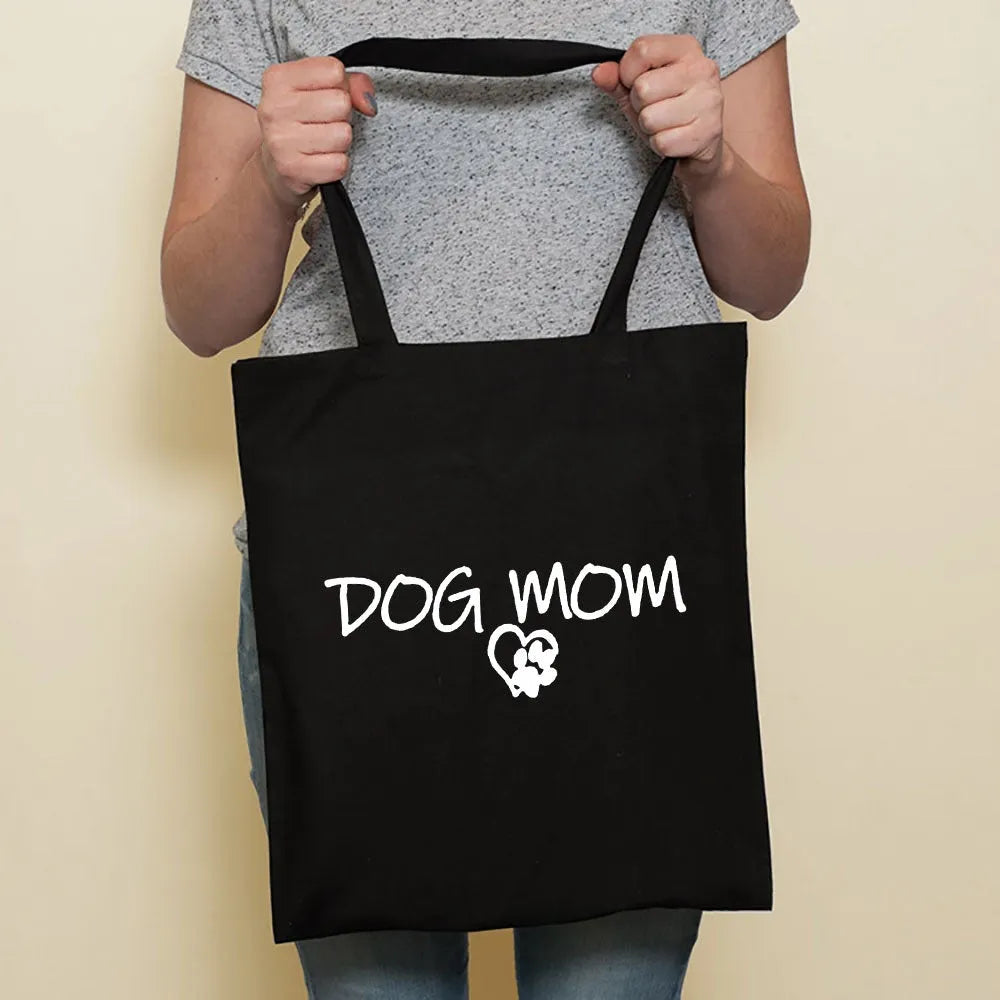 Sausage dog printed canvas bag in black with white dog design on front, sturdy tote for everyday use