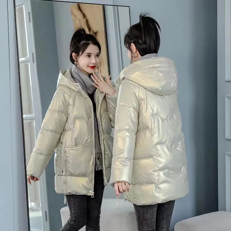 A women's loose-fitting thick hooded winter jacket in an acrylic polyester fabric.