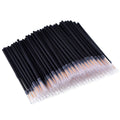 Pack of 100 disposable black eyeliner brushes with fine tips and plastic sleeves