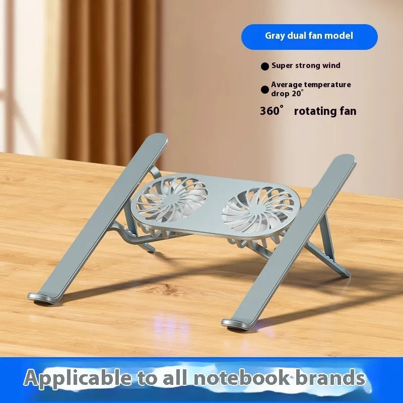 Silver aluminium laptop stand with dual cooling fans in folded position on desk