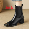 Brown slim-fit women's Martin boots with high heel and side zip on a white background