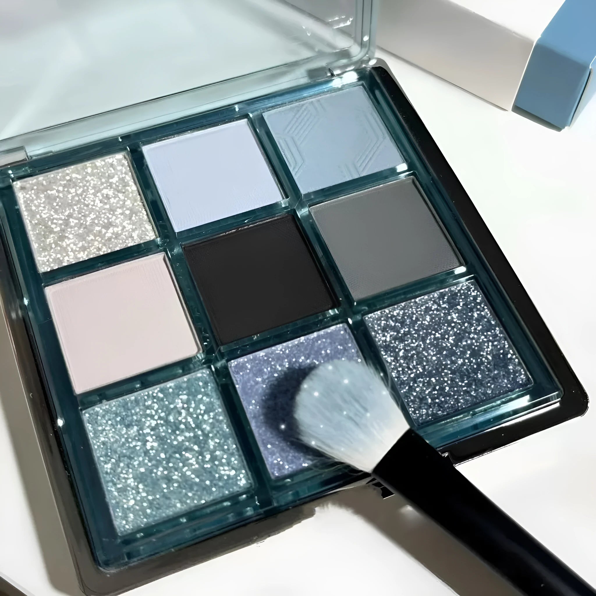 MUGELEEN nine-colour eye shadow palette 08 showing matte and shimmer blue smoked tones