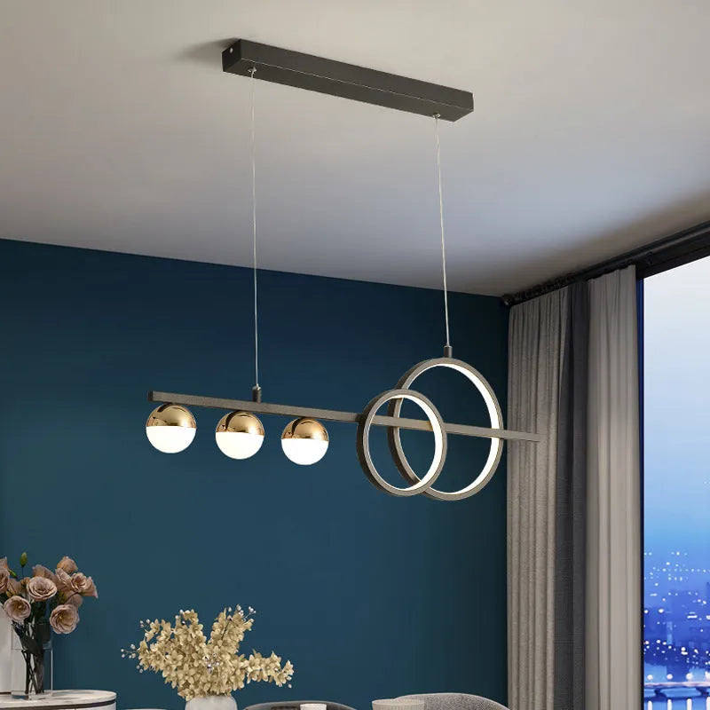 Modern rectangular aluminium ceiling lamp in black or gold finish with remote control for dimming.