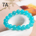 Natural amazonite scattered beads in ice colour with polished surfaces, showing single circle and three ring styles