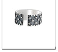 Sterling silver ring with five-pointed star design and adjustable opening