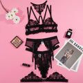 Black women's embroidery stitching mesh bikini bra and briefs set on a mannequin.