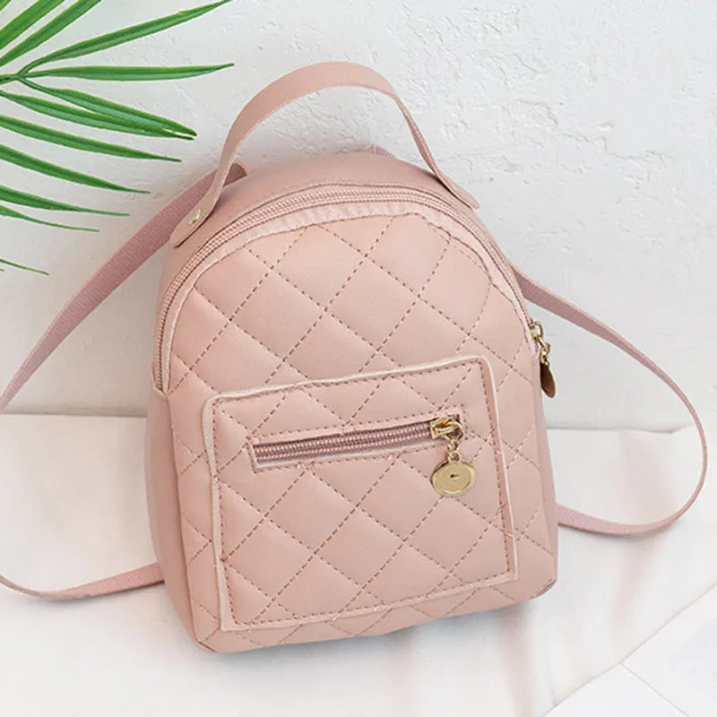 Hard white Korean style embroidered girls backpack showing sandwich pocket and soft carry handle.