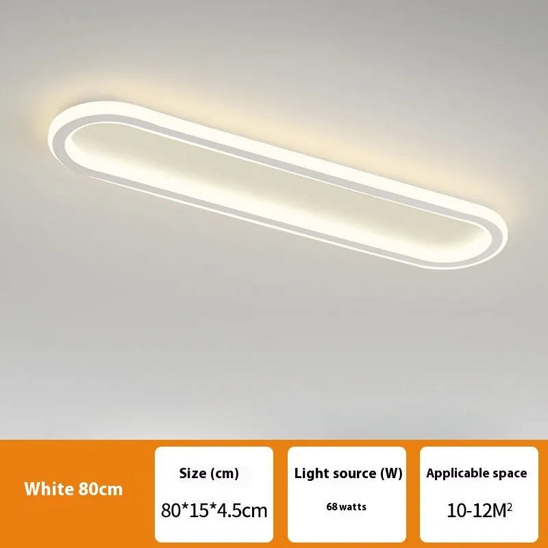 Black aluminium strip ceiling lamp with PVC shade in 60cm length mounted on a white ceiling.