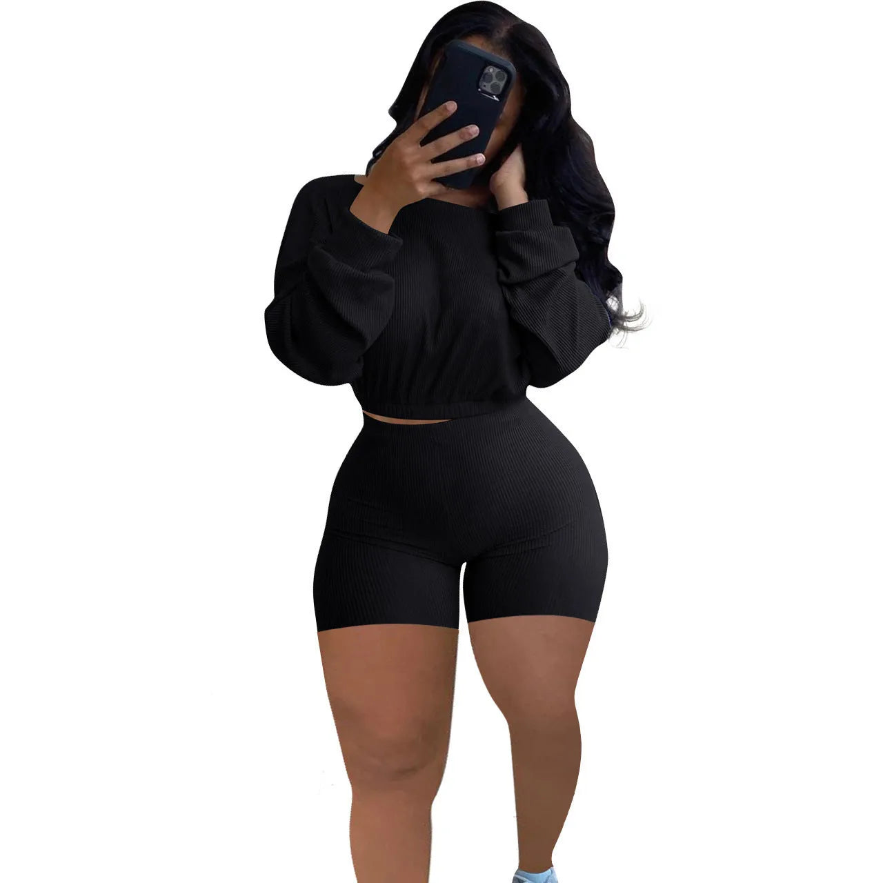 Sunken stripe solid colour off-the-shoulder long sleeve top and shorts two-piece set on a hanger.