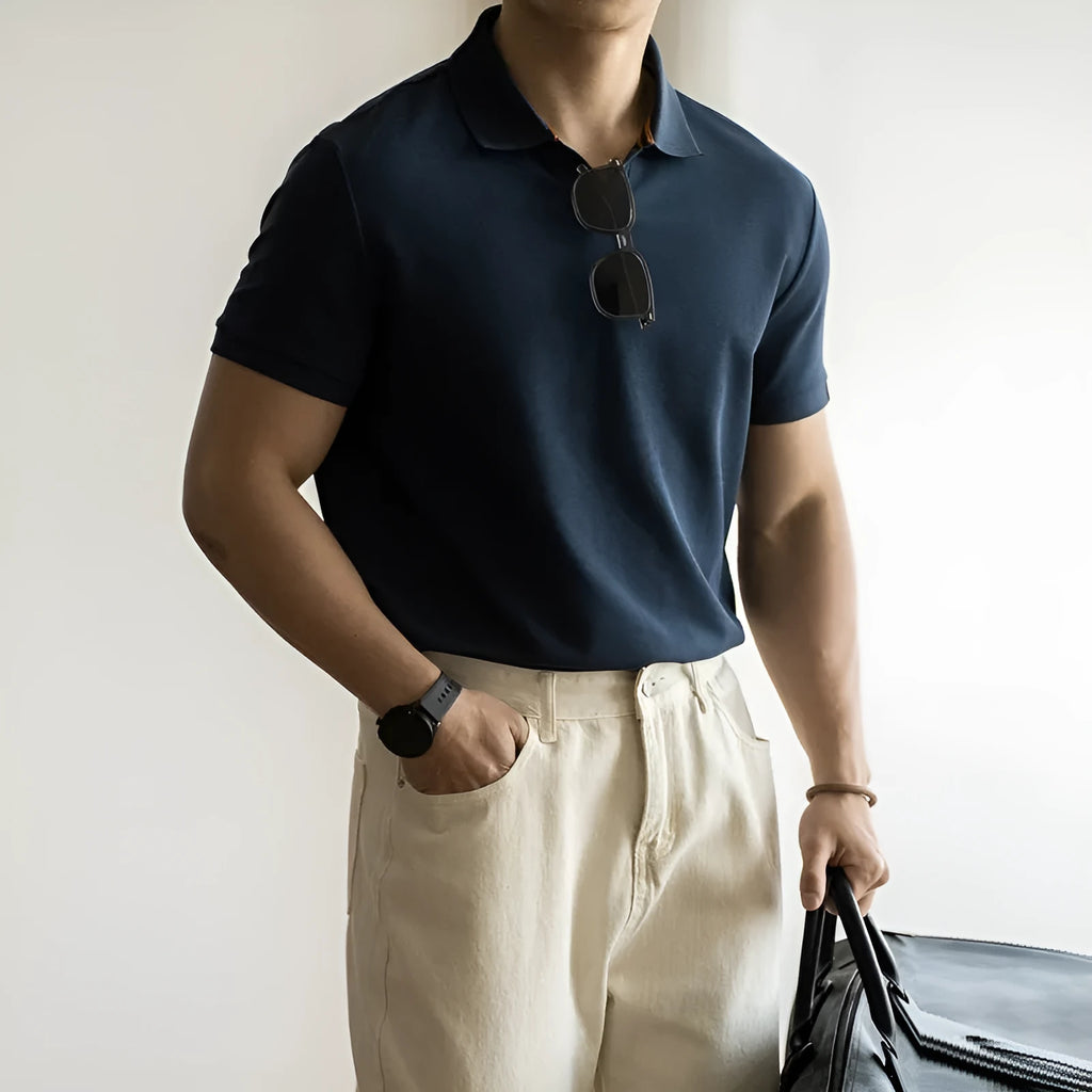 American-style short-sleeved polo shirt in blue, black, or white on a hanger.
