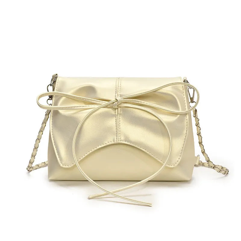 Women's black PU leather crossbody bag with horizontal square shape and visible sewing details