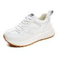 Women's beige-lined white casual sports shoes made from cattlehide leather with an English muffin heel.