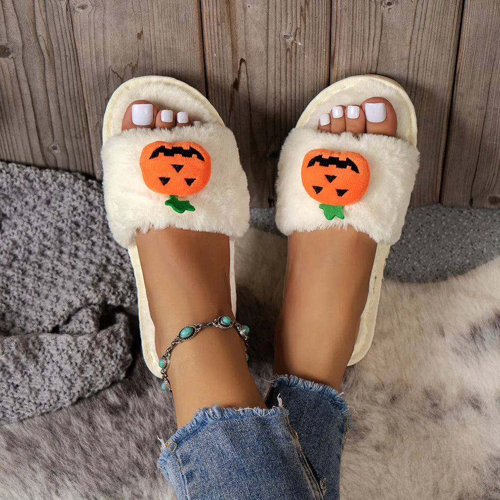 White and yellow Halloween cartoon pumpkin plush open-toe slippers with anti-slip PVC soles.