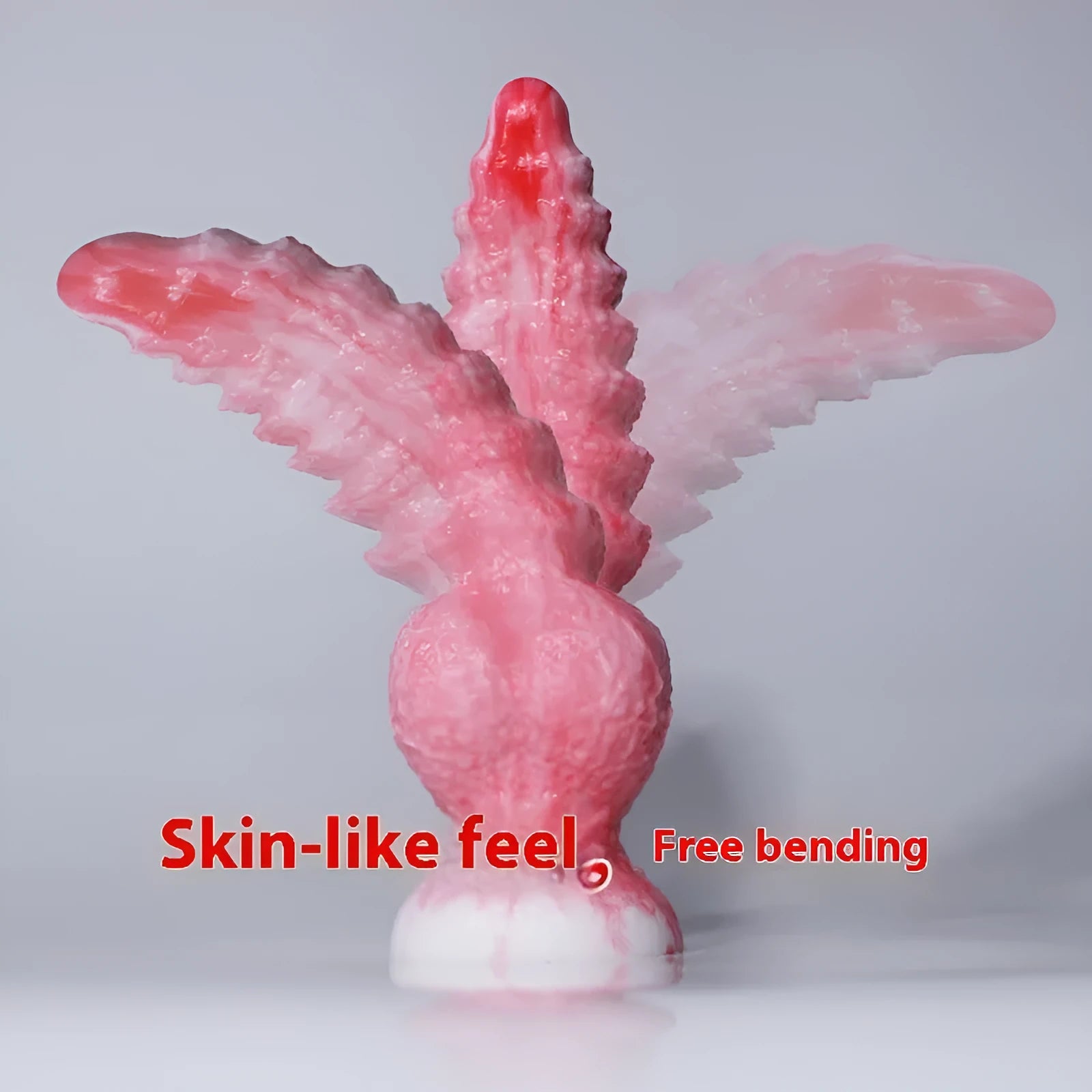 Pink platinum silicone women's masturbation toy shaped like a penis