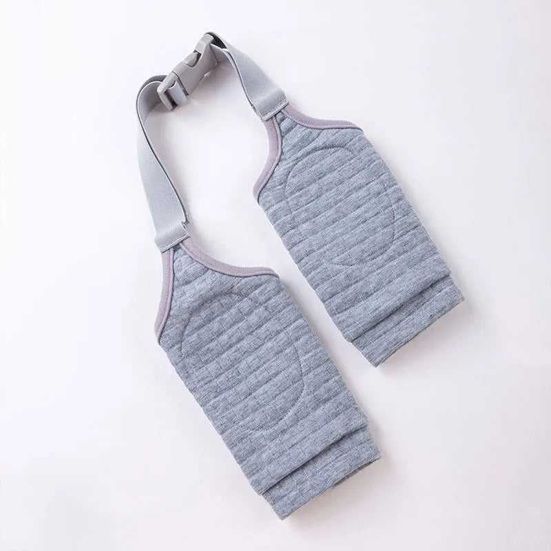 Blue dog knee protector pad with extra-thick elbow padding and matching scarf on a medium dog