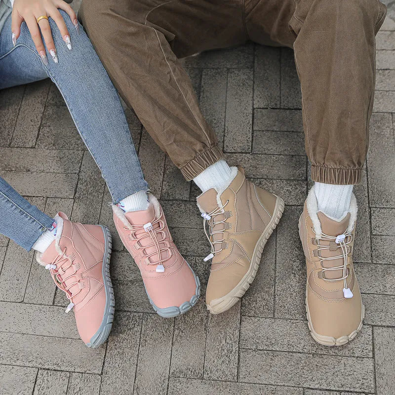 Waterproof fleece-lined snow boots with lace-up front and rubber soles in black, pink, or khaki