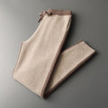 Men's camel coloured cashmere wool blend knitted cardigan suit with half turtleneck zip-up top and matching trousers