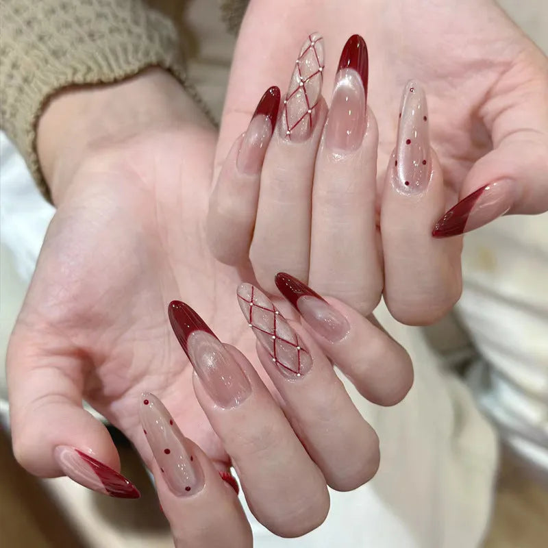 Assorted fake nail sets for girls in various colours and patterns.