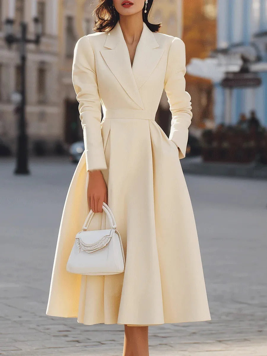 Women's high waist flared long sleeve dress in solid black polyester with waist-tucking design, front view.