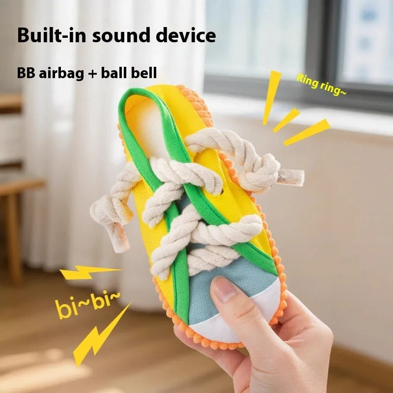Plastic dog chew toy with bends design in rock yellow colour showing self-hi sound feature