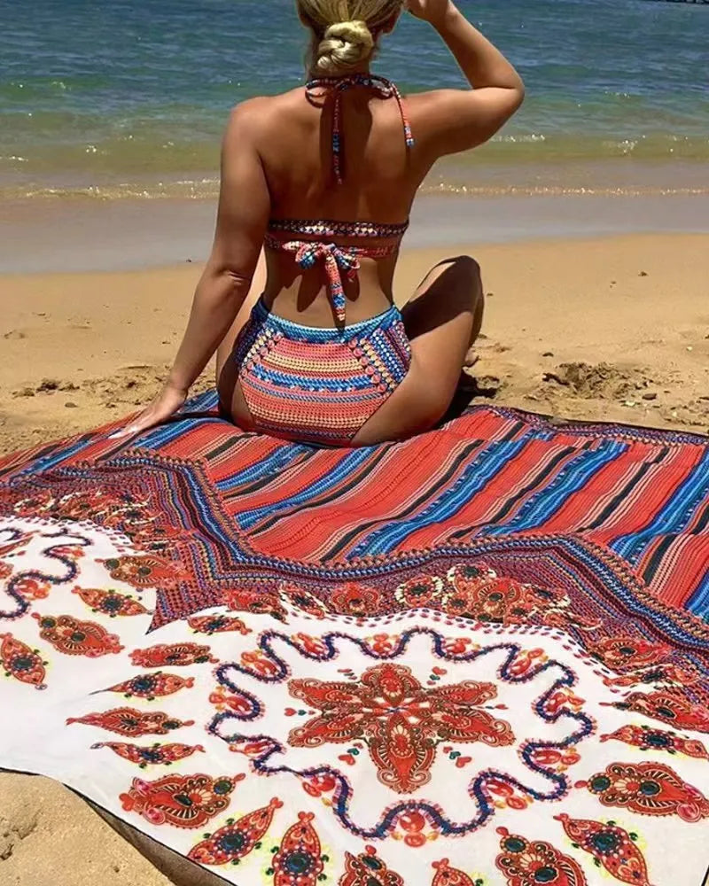 Women's three-piece split swimsuit set showing high-waist briefs and cutout blouse in polyester fabric