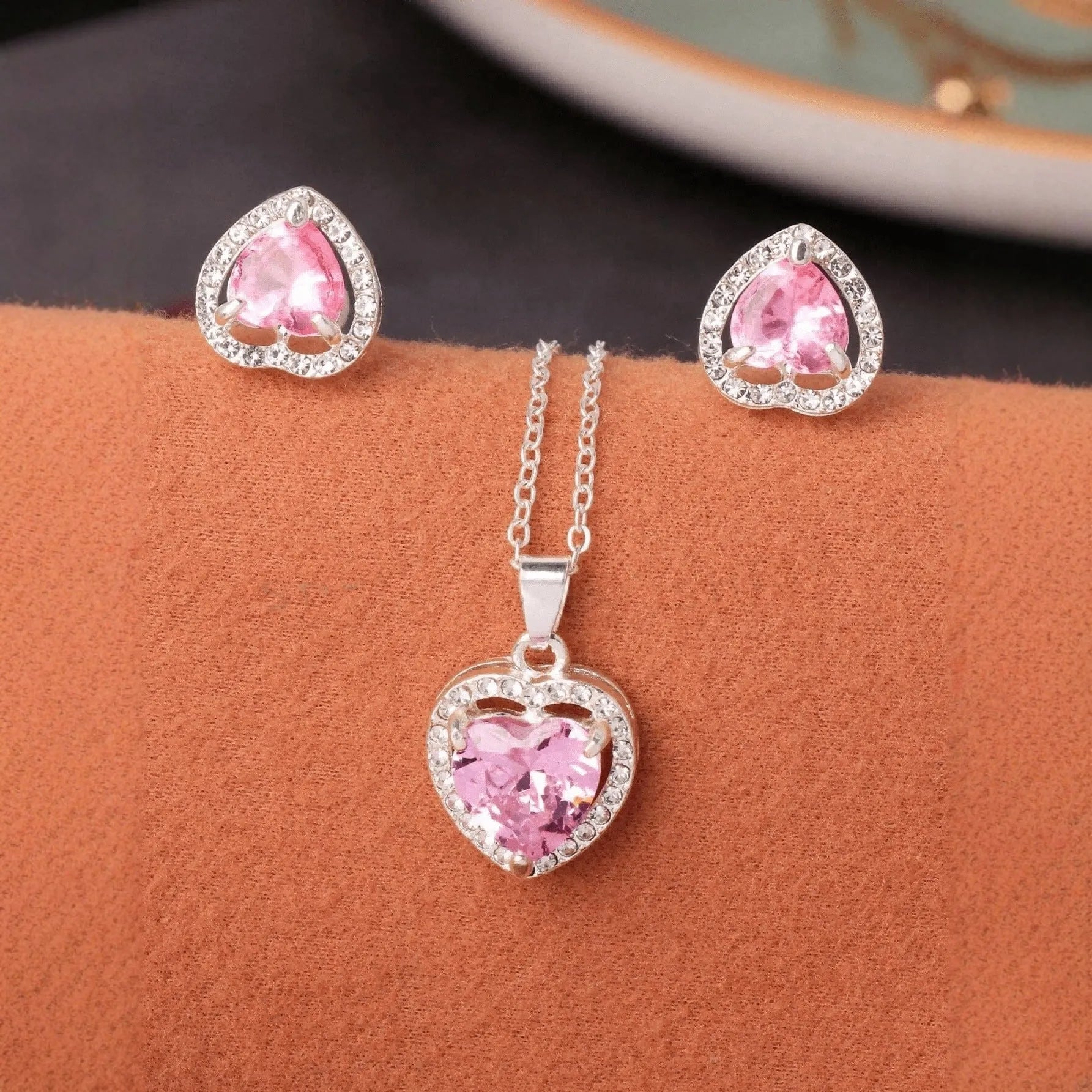 Pink crystal zircon heart-shaped pendant dangle drop earrings set on white background