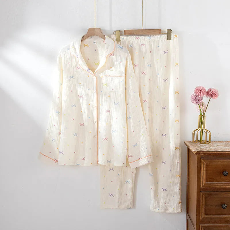 Women's long-sleeved cotton pyjama set in lightweight fabric available in pink or beige