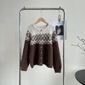 Women's beige jacquard knit sweater coat with contrast pattern, shown with long sleeves and a loose fit.
