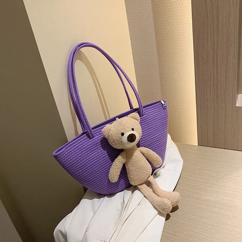 Cotton and linen woven shoulder bag in dumpling shape with three-dimensional pocket and double straps