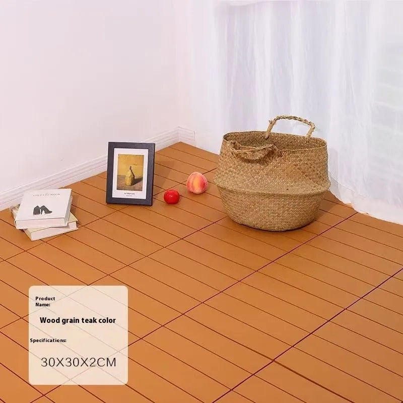 Wood grain plastic interlocking floor tile showing non-slip surface texture