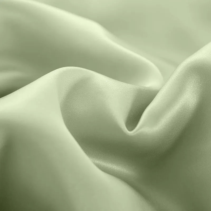 Pure silk duvet cover in a solid colour, showing texture and available in multiple size options.