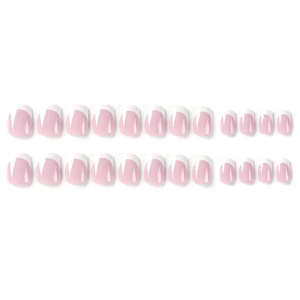 24 white fake nail plates with a black and white plaid pattern, shown in a nail tip style.